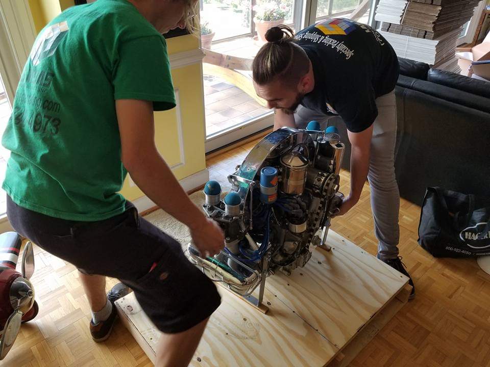 Crew installing display cases in a themed retail space