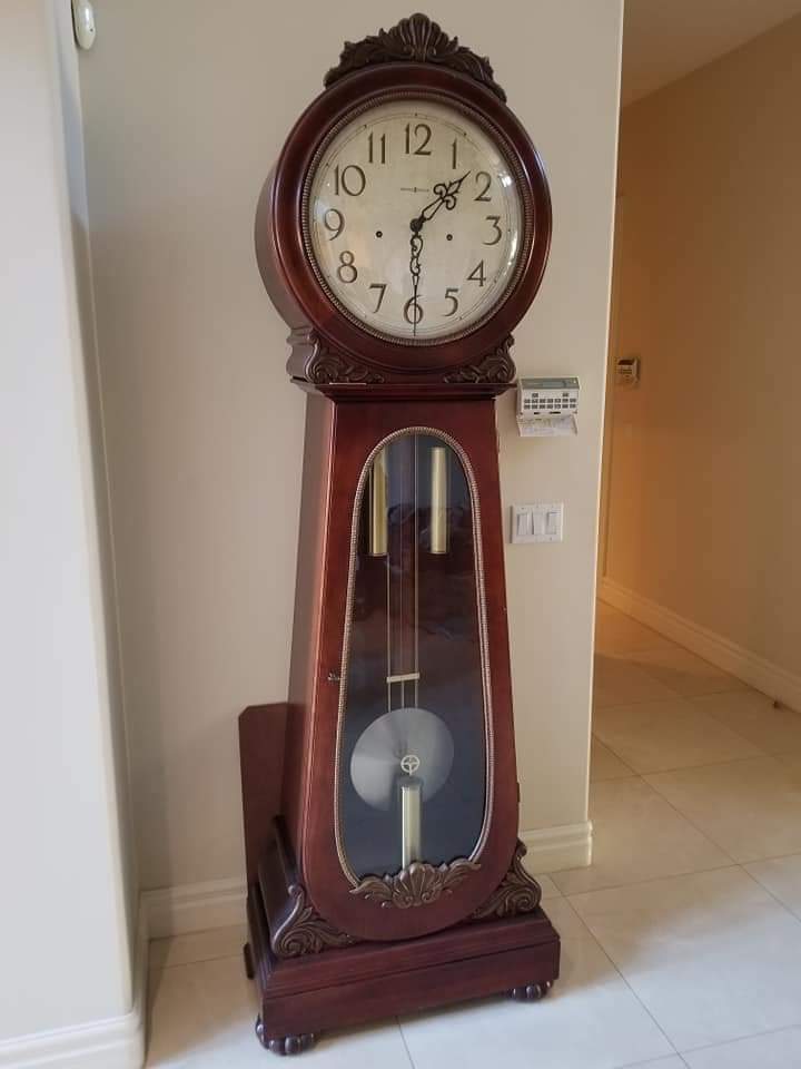 Antique grandfather clock ready for careful transport